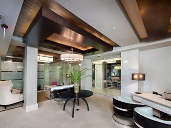 A large room with a table and chairs